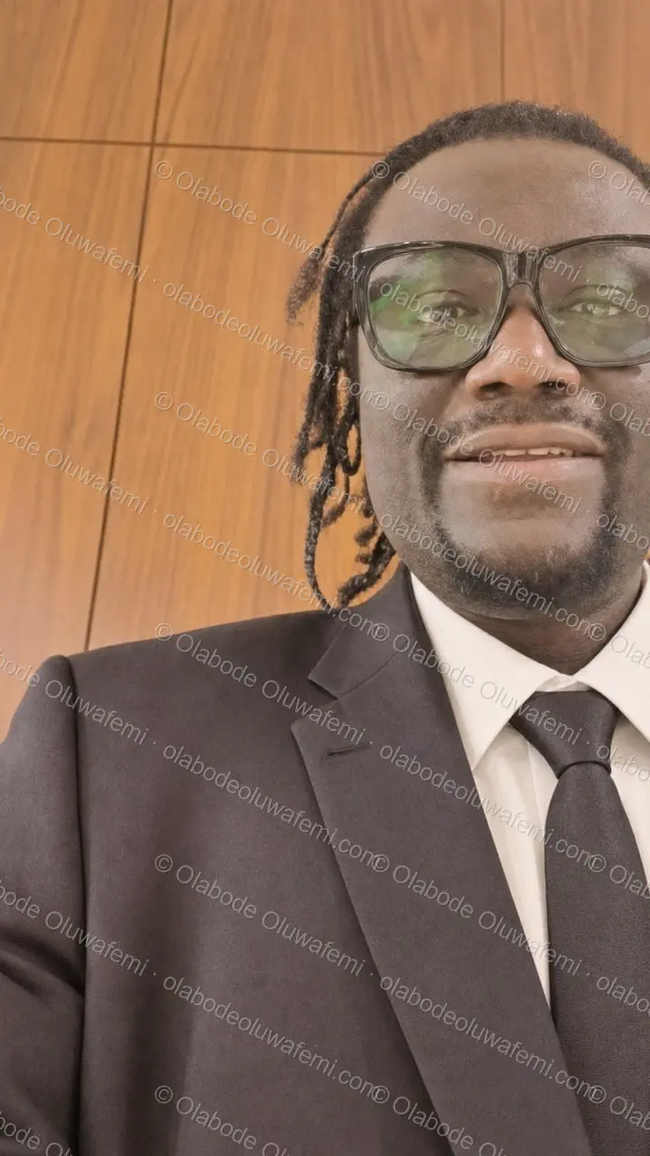 Olabode Oluwafemi — official portrait — Phone / Story