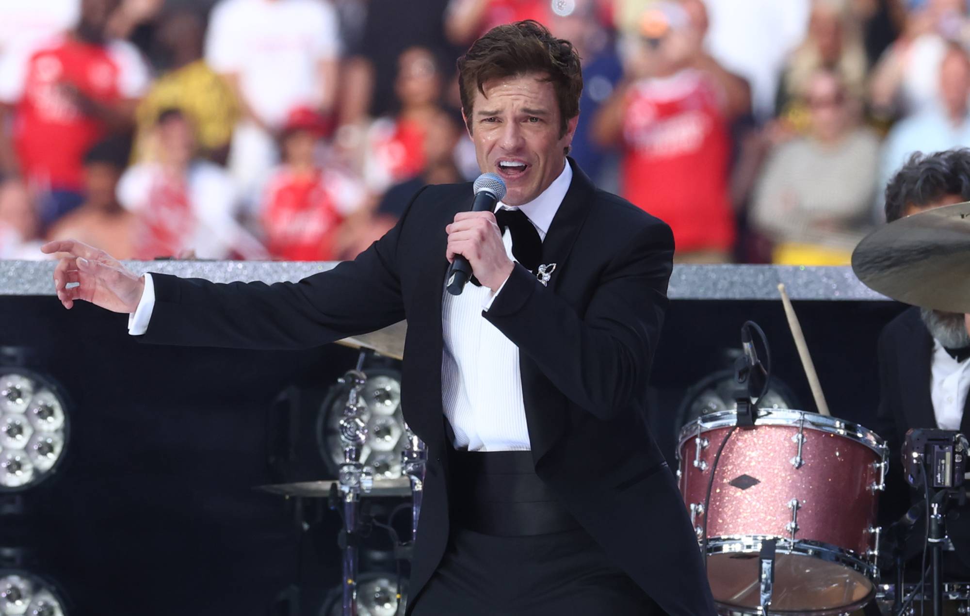 Brandon Flowers Shines at Newport Folk Festival with New Music and Iconic Collaborations — story image